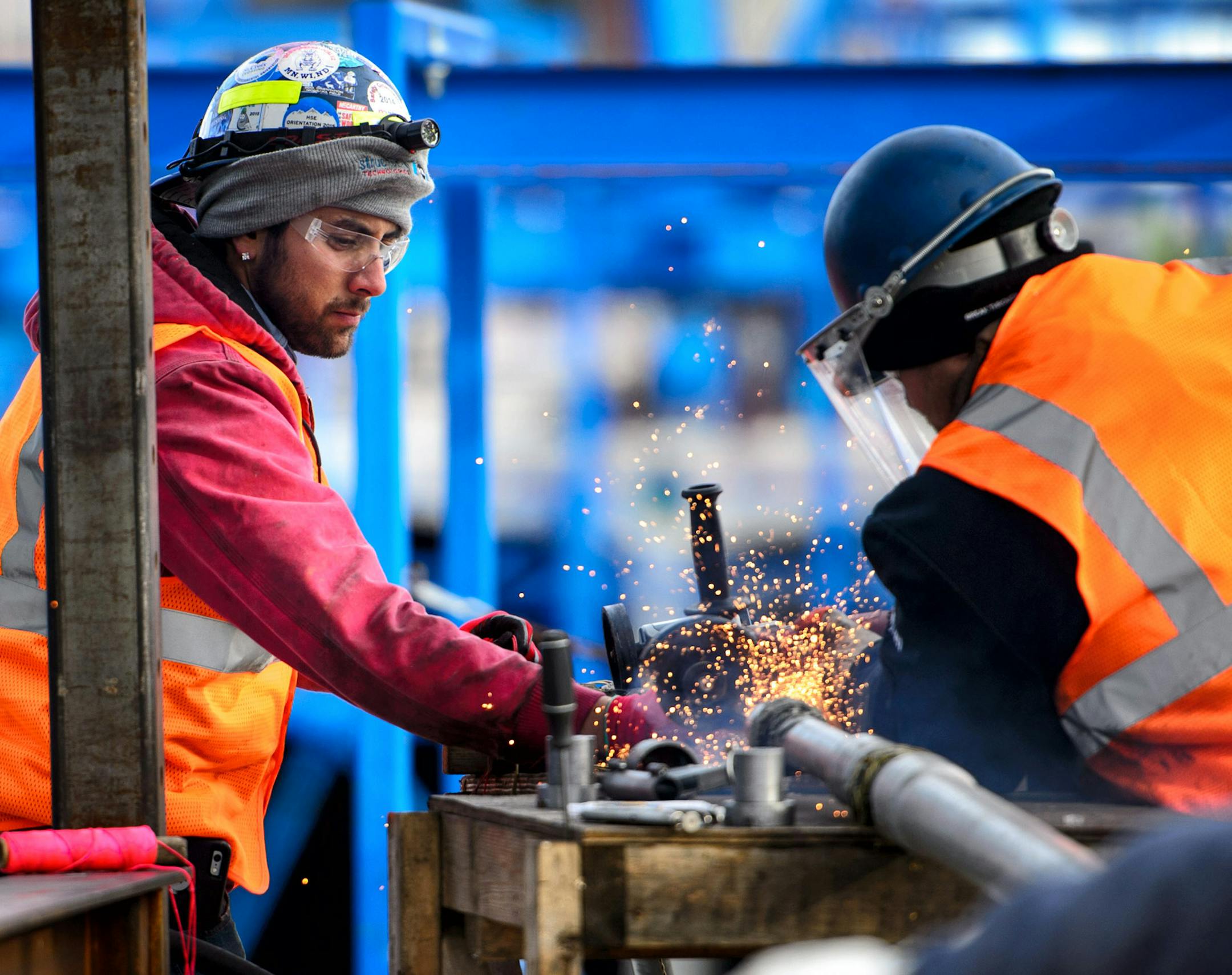 Workers pulled suspension cable to hold the massive St. Croix Crossing bridge. ] GLEN STUBBE * gstubbe@startribune.com Friday, November 20, 2015 Construction of the massive St. Croix Crossing bridge project in Stillwater, MN will be 60 percent finished when winter hits, but questions remain about a new completion date.