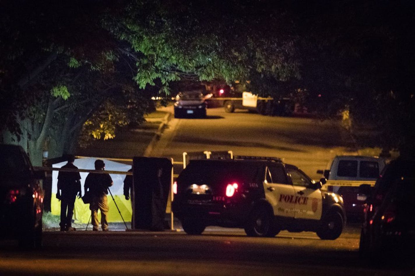 St. Paul Police and the Minnesota BCA investigate an officer involved shooting crime scene on Euclid Street.