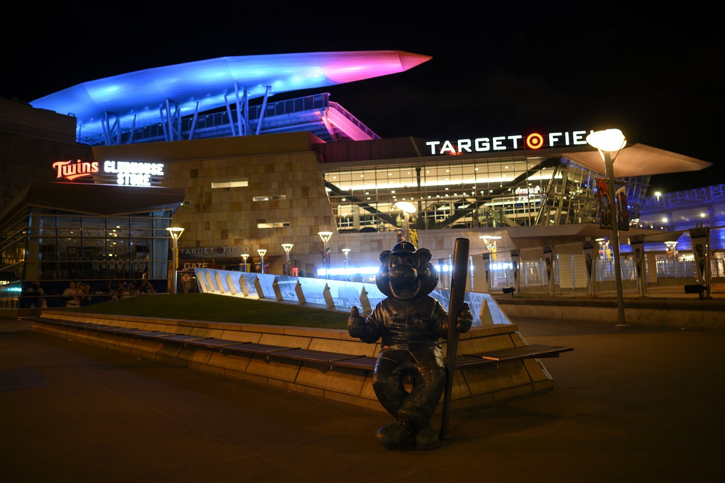 Target Field is lit blue to honor medical and essential workers on the front line of the COVID-19 pandemic, Thursday, April 9, 2020, in Minneapolis. (Aaron Lavinsky/Star Tribune via AP)