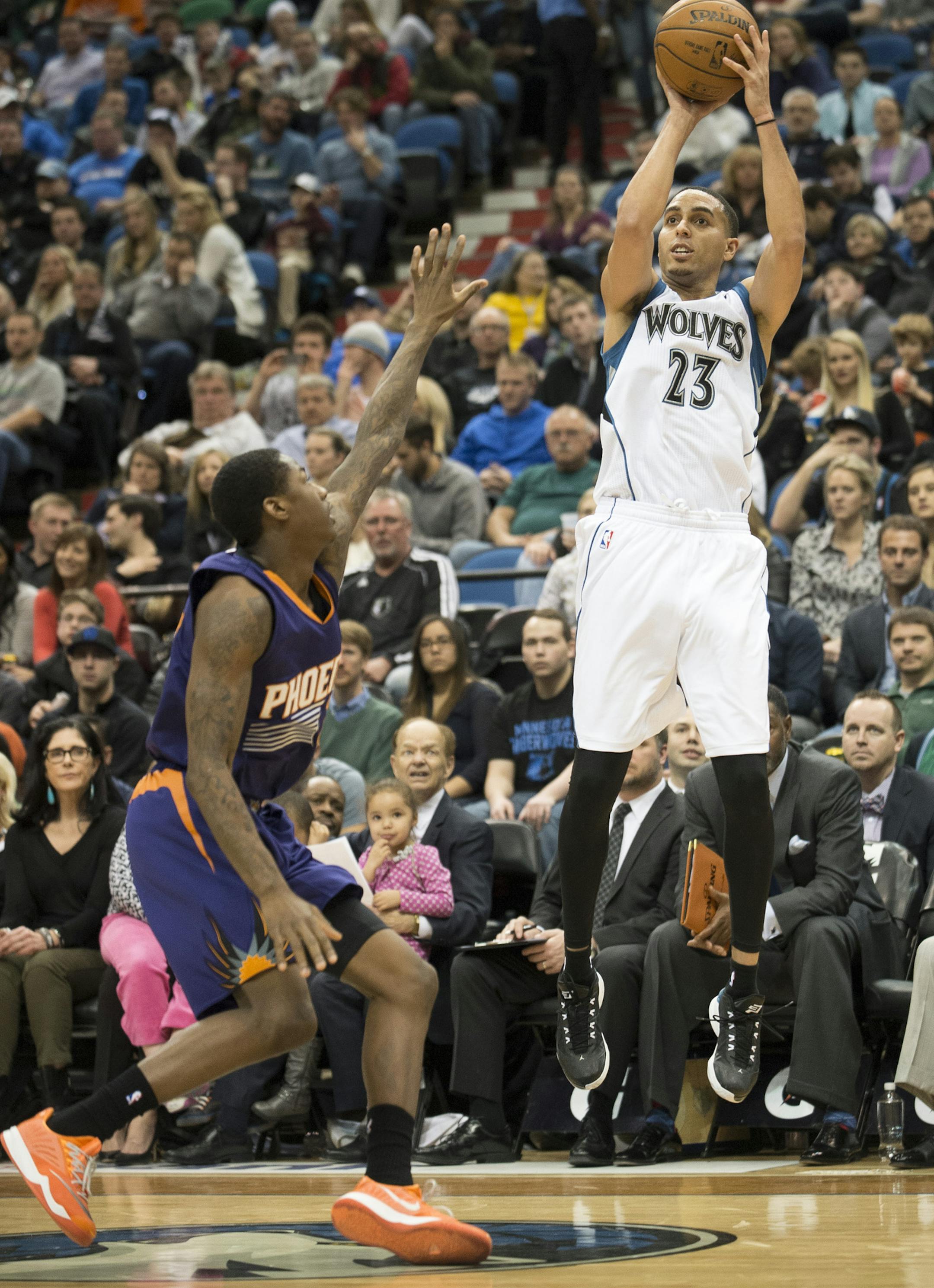Minnesota Timberwolves guard Kevin Martin (23) hits a 3-point shot as Phoenix Suns guard Archie Goodwin (20) defends in the second half. ] (Aaron Lavinsky | StarTribune) The Phoenix Suns play the Minnesota Timberwolves on Friday , Feb. 20 2015, at Target Center ORG XMIT: MIN1502202204392488