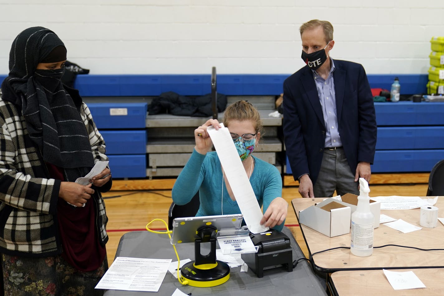 Minnesota Secretary of State Steve Simon visits with poll workers as he toured the Brian Coyle Center, on Election Day Tuesday, Nov. 3, 2020, in Minneapolis.