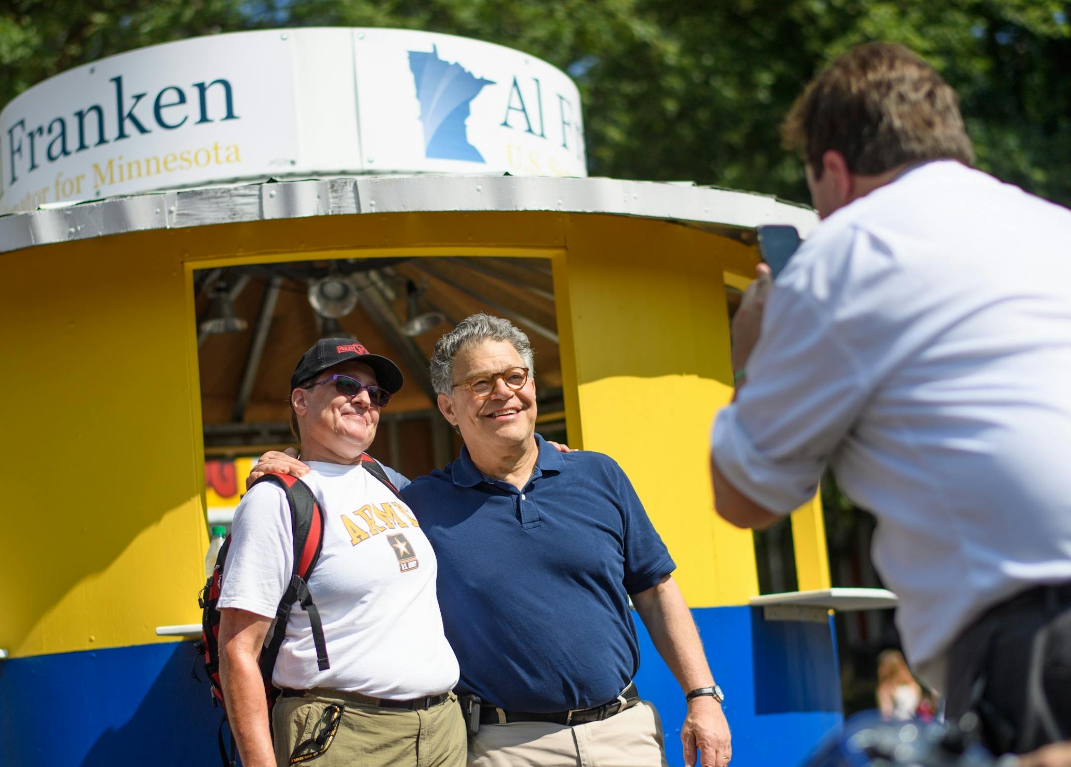 U.S. Senator Al Franken talked with fairgoers and posed for photos at Franken's booth on Underwood St at the Minnesota State Fair.here with Veteran Cindy Connell who served with the Red Bulls from 1984 to 2005.