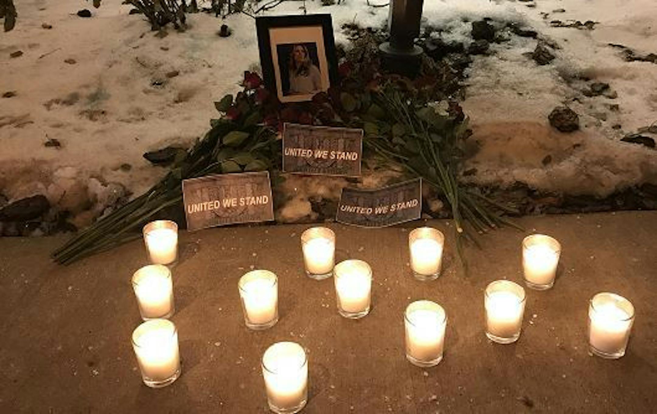 A shrine to Justine Damond sat outside the 5th Precinct headquarters.