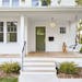 The homey wraparound front porch adds architectural character, outdoor sitting areas and shelter from the rain, while blending in with other older hom