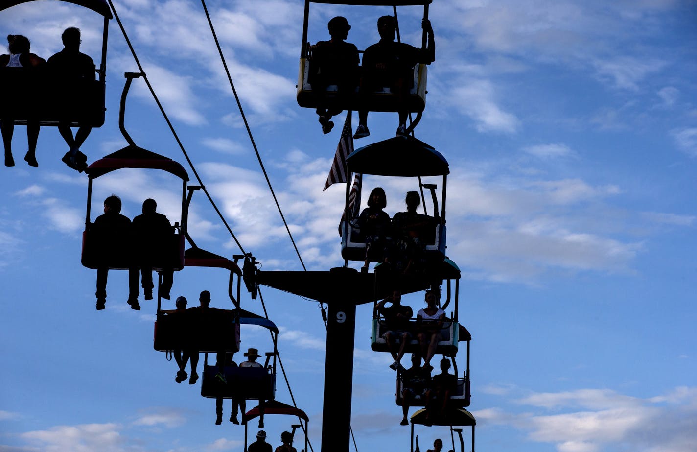 Fairgoers ride on the SkyGlider on the last day of the Minnesota State Fair on Monday, September 7, 2015. ] LEILA NAVIDI leila.navidi@startribune.com /