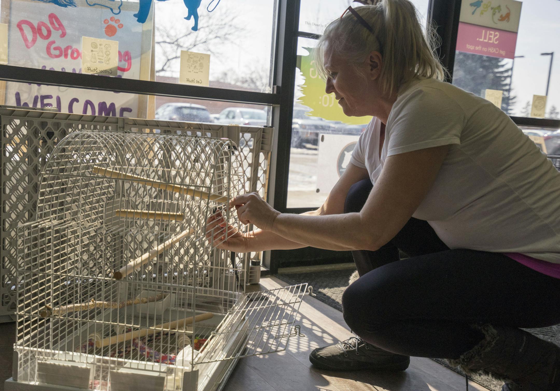 Co-owner Betty VanGorder fixes a bird cage at her store, the Pet Garage on Friday, March 8 in Maple Grove, Minn. ]
TONY SAUNDERS ° anthony.saunders@startribune.com