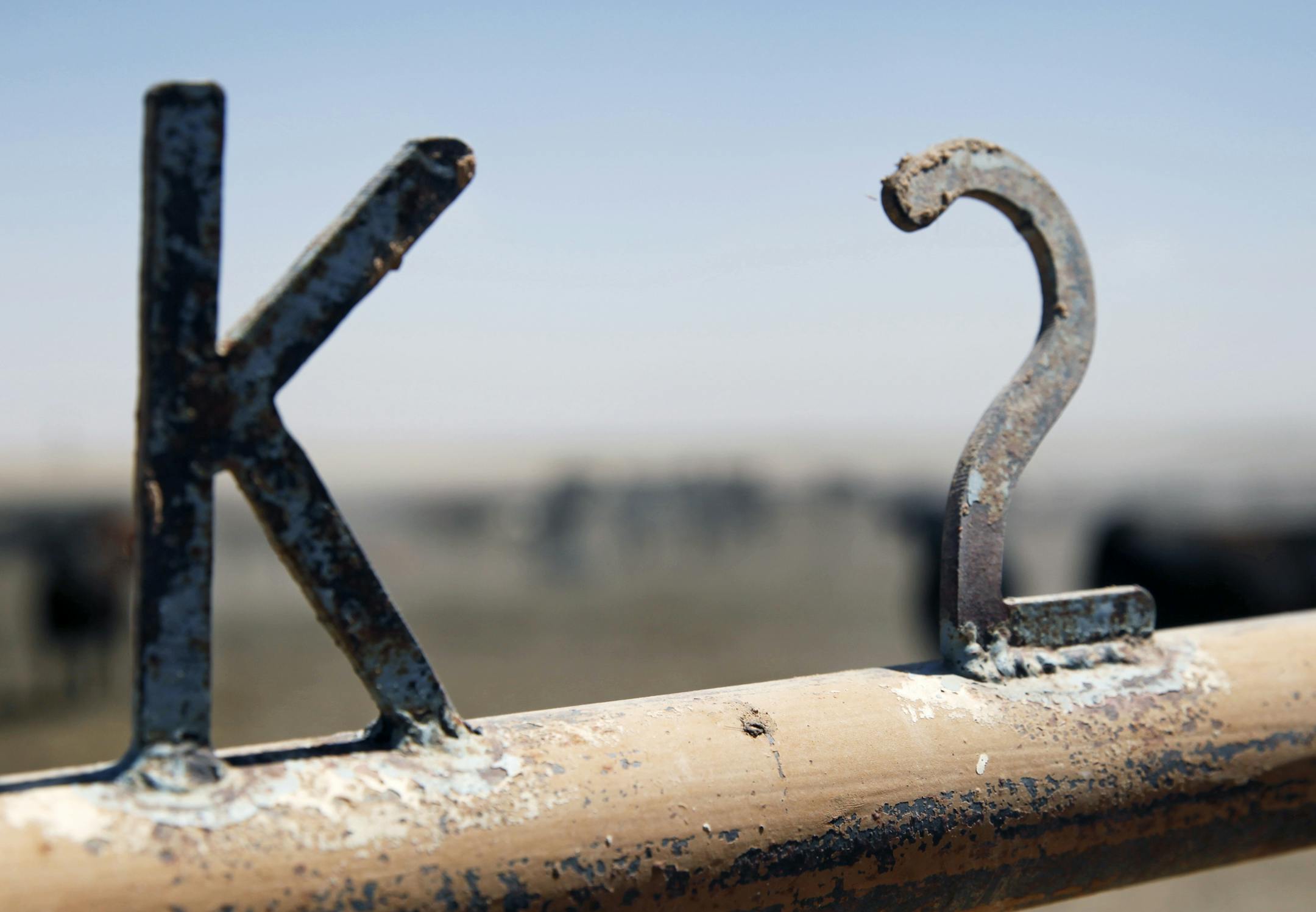 On April 30th, 2014 at the Cargill feedlot in Dalhart, Texas, a detail from one of the cattle pens.