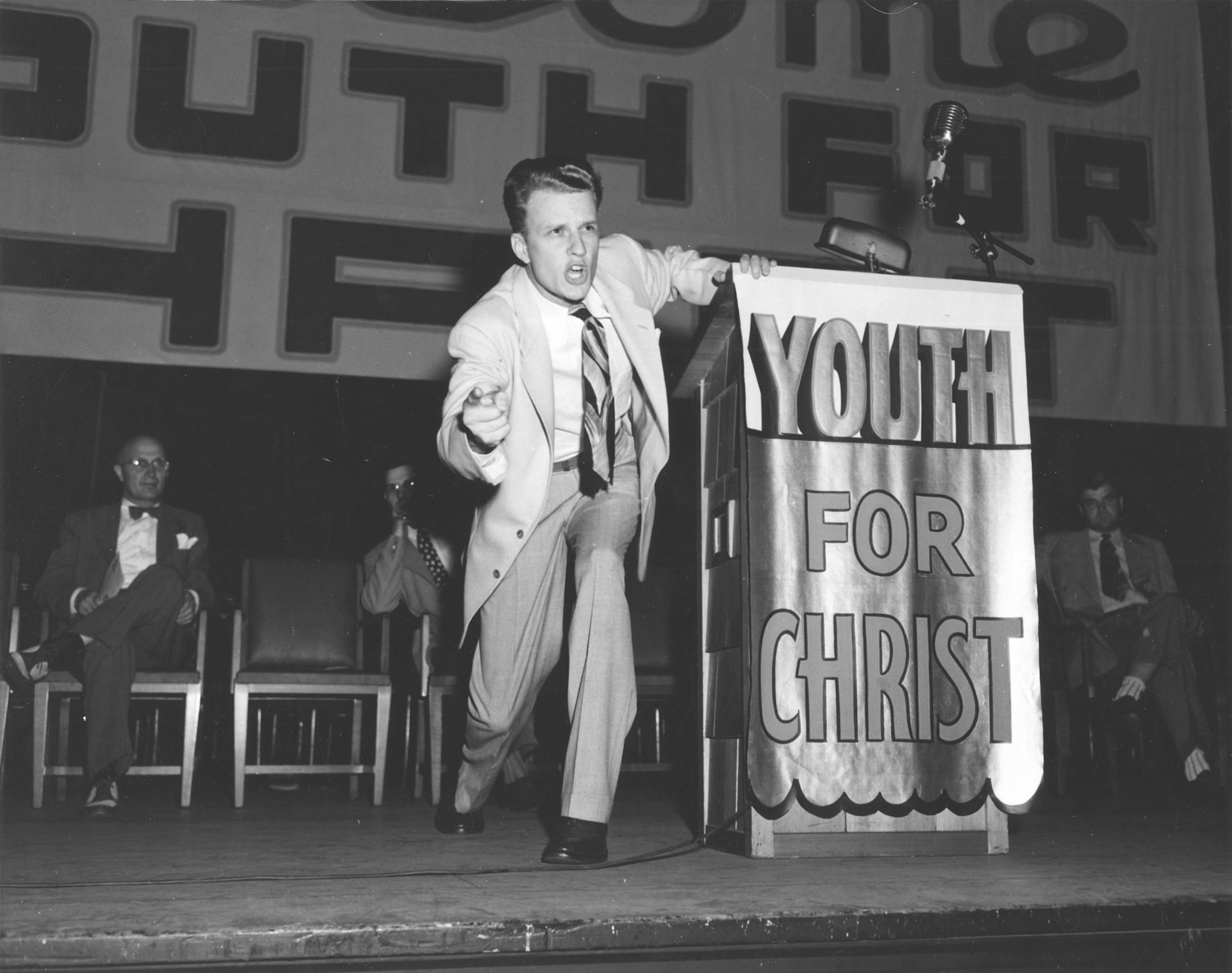 An undated handout image of Billy Graham in "God in America," a presentation of the "American Experience" on PBS. Fox News may dominate the British view of American news organizations, but PBS is highlighting its own style with its first international venture. (Billy Graham Center via The New York Times) -- NO SALES; FOR EDITORIAL USE ONLY WITH STORY SLUGGED PBS BRITAIN BY ERIC PFANNER. ALL OTHER USE PROHIBITED. --