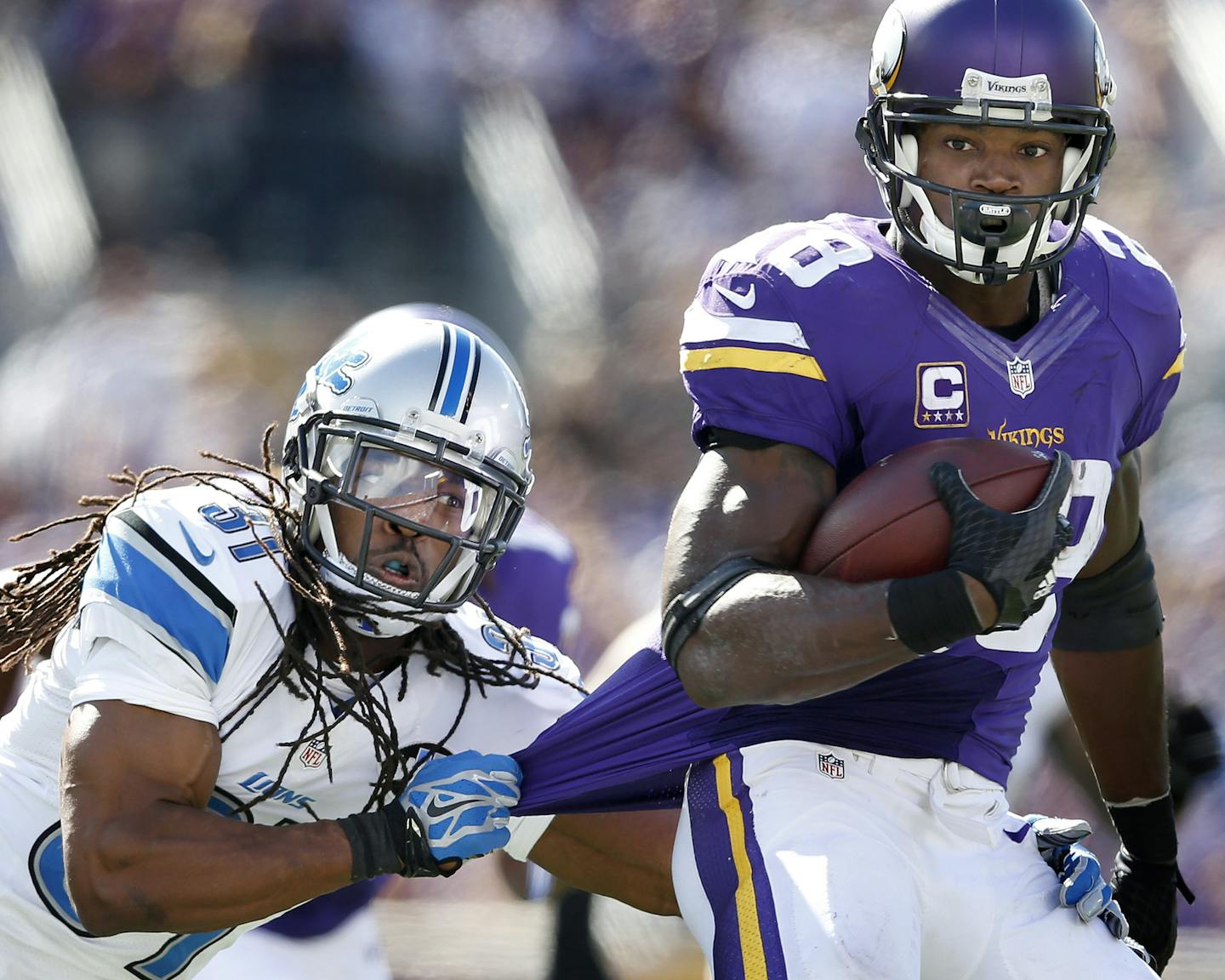 Vikings running back Adrian Peterson (28) was chased by Rashean Mathis (31) in the fourth quarter. ] CARLOS GONZALEZ cgonzalez@startribune.com - September 20, 2015, TCF Bank Stadium, Minneapolis, MN, NFL, Minnesota Vikings vs. Detroit Lions