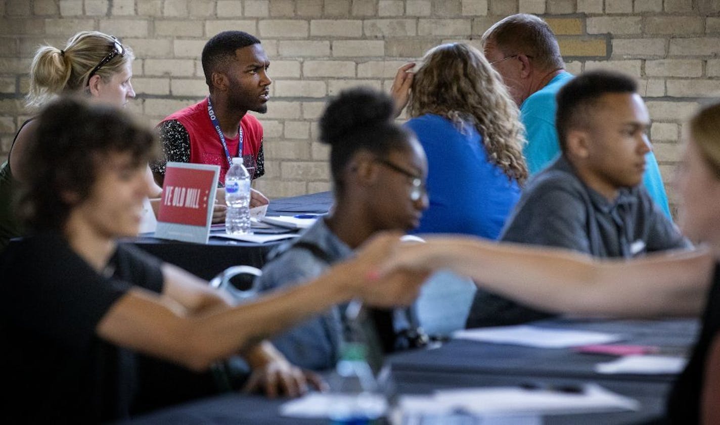 Interviews at multiple tables were conducted interview at the Minnesota State Job Fair on Tuesday.