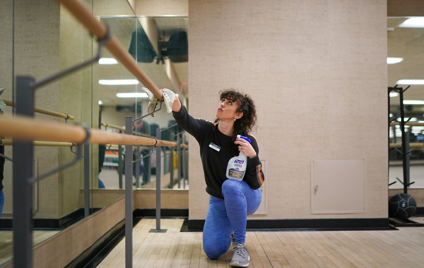 Studio manager Elizabeth Sousek cleaned cleaned the studio bars at Life Time Fitness with Purell surface disinfectant more frequently on surfaces around the club. ] GLEN STUBBE &#x2022; glen.stubbe@startribune.com Wednesday, March 11, 2020 Workers at Life Time Fitness used Purell surface disinfectant more frequently on surfaces around the club.