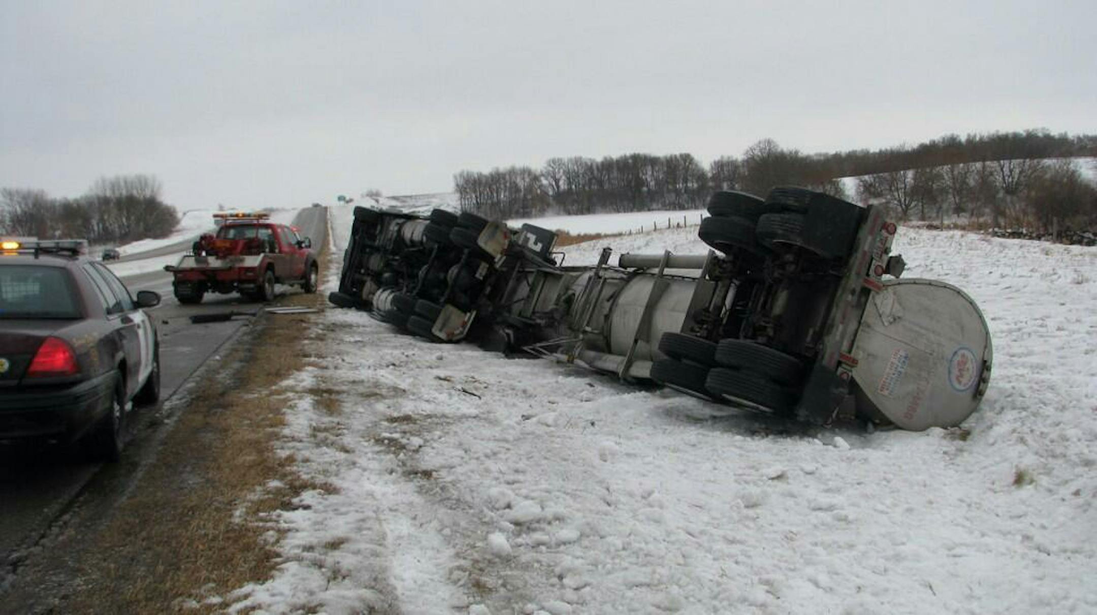A tanker truck carrying airline de-icer rolled over on eastbound I-94 near Evansville, Minn. on Friday. The contents did not leak.