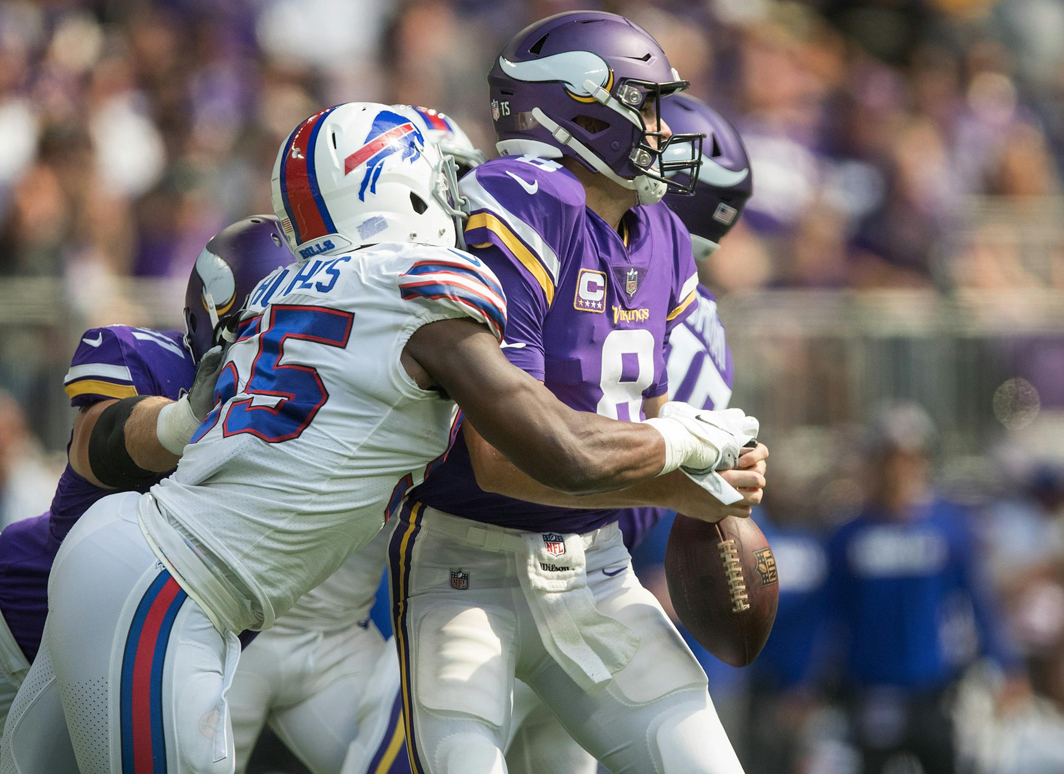 Minnesota Vikings quarterback Kirk Cousins (8) fumbled the football after he was hit by Buffalo Bills defensive end Jerry Hughes (55) US Bank Stadium Sunday September 23, 2018 in Minneapolis, MN. ] JERRY HOLT ï jerry.holt@startribune.com
