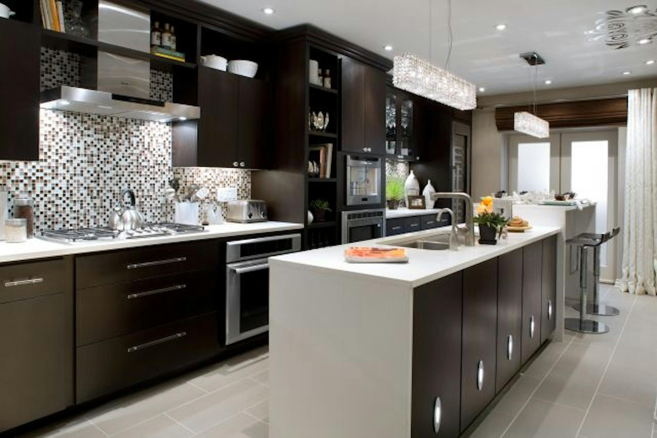 By blending modern tiles, cabinets and floors with a variety of traditional finishes, Ken and Annette got a kitchen that is elegant, contemporary -- and kid-free!