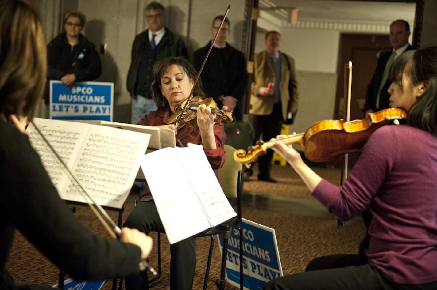 Jan. 23: Members of the Saint Paul Chamber Orchestra played outside the committee hearing room where the Minnesota House Commerce and Consumer Protection Committee was examining the economic impact of employee lockouts.