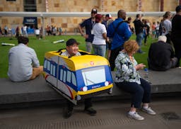 Kou Yang, an Metro Transit bus driver, sat at an event Tuesday marking Metro Transit's light-rail line anniversaries — 20 years of service for the B