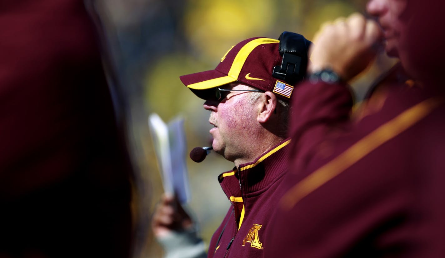 Minnesota head coach Jerry Kill watches from the sideline during the BigTen match up between the University of Minnesota and Michigan Saturday at Michigan Stadium in Ann Arbor, Michigan .