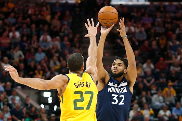 Timberwolves centers Karl-Anthony Towns, right, and Rudy Gobert, who have played against each other a lot in the past, will likely play together for t
