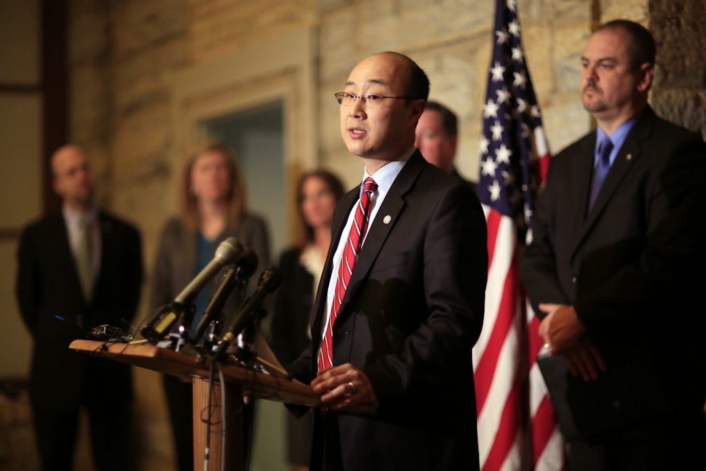 Two St. Paul brothers and their uncles have been charged with operating a sex-trafficking ring for nearly two years in what Ramsey County Attorney John Choi (Center) called "an evil conspiracy" that left in its wake numerous victims, with at least one a 15-year-old girl.