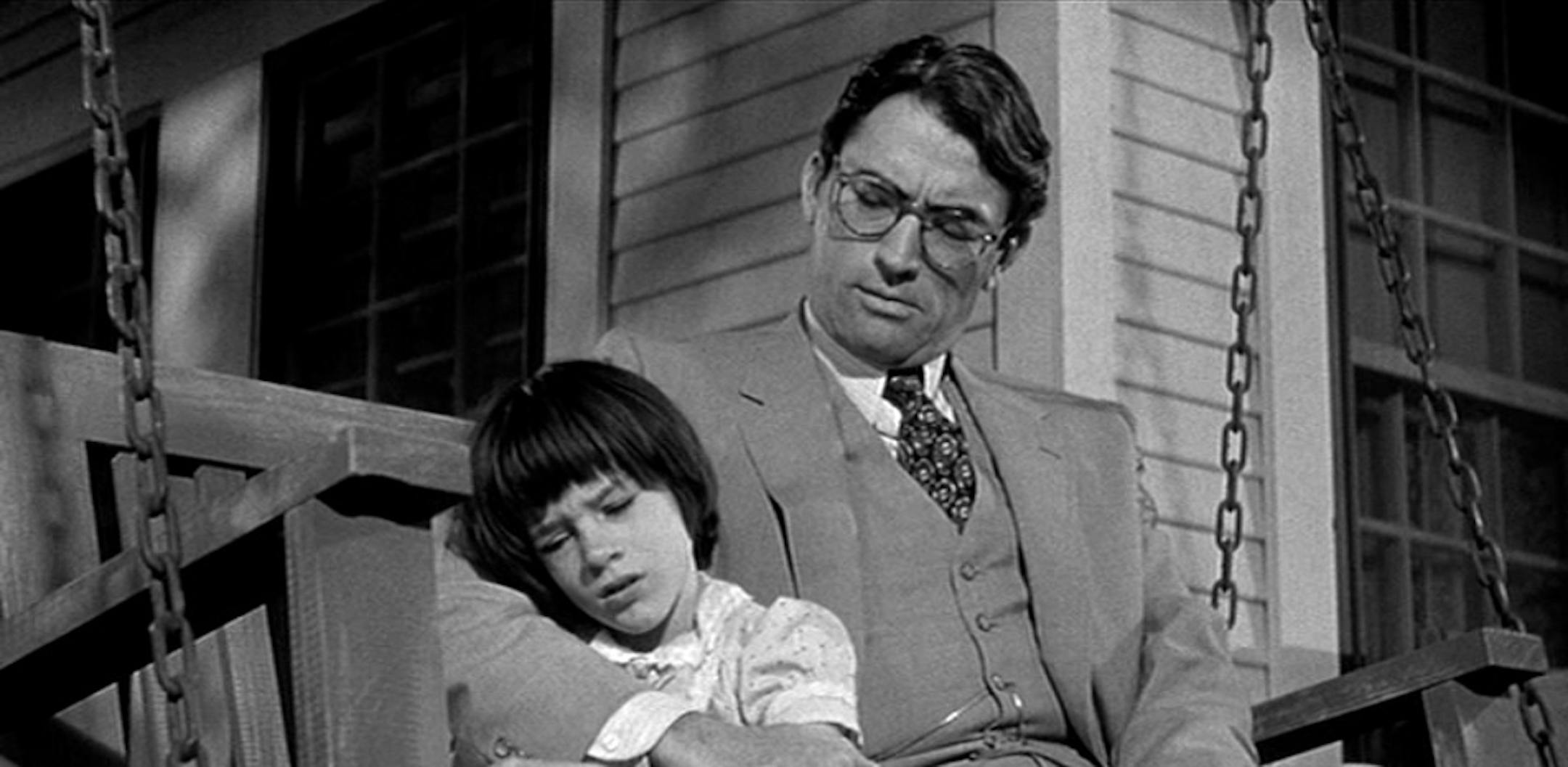 Mary Badham and Gregory Peck in the 1962 film "To Kill a Mockingbird," in an undated handout. The novel's publisher, HarperCollins, plans to issue four new editions of the novel this summer and host a variety of national events in light of the book's 50-year anniversary. (Universal Pictures via The New York Times) -- MAGS OUT/NO SALES; FOR EDITORIAL USE ONLY WITH STORY SLUGGED MOCKINGBIRD ANNIVERSARY BY JULIE BOSMAN. ALL OTHER USE PROHIBITED. -- ORG XMIT: MIN2014040914223986