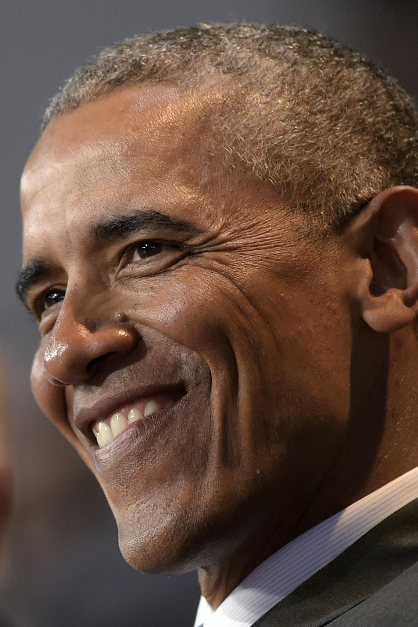 President Barack Obama, center, sitting with Vice President Joe Biden and Defense Secretary Ash Carte, listens as Joint Chiefs Chairman Gen. Joseph Dunford, talks about him during an Armed Forces Full Honor Farewell Review for the president, Wednesday, Jan. 4, 2017, at Conmy Hall, Joint Base Myer-Henderson Hall, Va. (AP Photo/Susan Walsh)