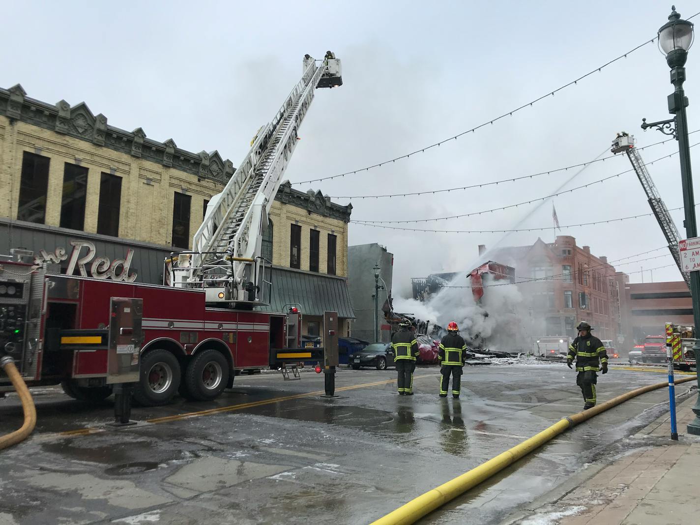 Firefighters battled a blaze at the Press and Parlor Bar in St. Cloud.