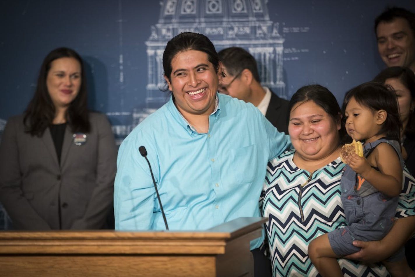 Uriel Rosales Tlatenchi, a DACA recipient, introduced his family including his wife Arianna Lopez and two-year-old son Atzel Rosales Lopez, after he spoke about how DACA has improved his life during a "DACA Five Years Later" press conference by NAVIGATE MN and the Minnesota-Dakotas Chapter of the American Immigration Lawyers Association on Tuesday, August 15, 2017 at the Minnesota State Capitol in St. Paul, Minn.