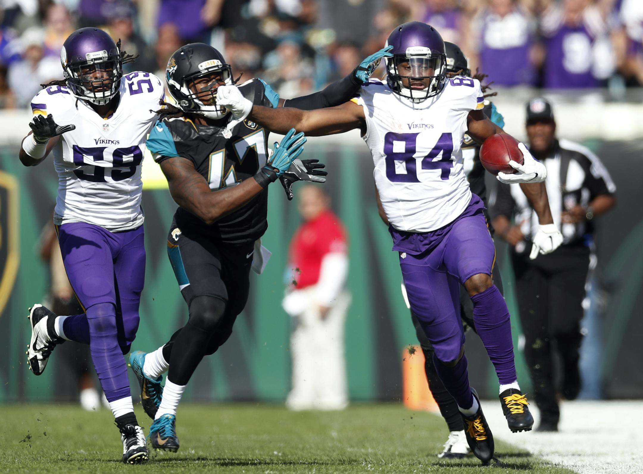Minnesota Vikings wide receiver Cordarrelle Patterson (84) was pushed out of bounds on a kick off return by Jacksonville Jaguars defensive back Jarrod Wilson (47) in the second quarter at EverBank field Sunday December 11,2016 in Jacksonville, Florida.