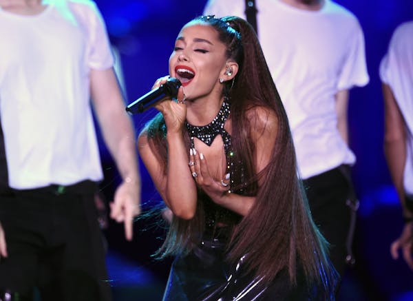 FILE - In this June 2, 2018 file photo, Ariana Grande performs at Wango Tango in Los Angeles. Grande will return with a new tour in 2019 nearly two ye