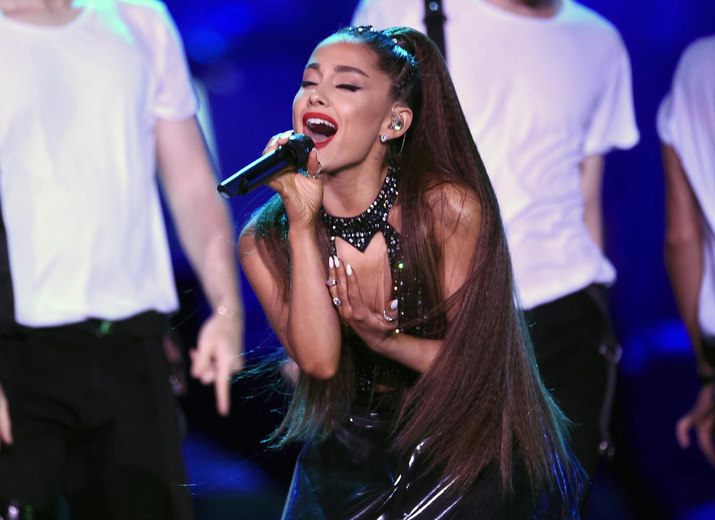 FILE - In this June 2, 2018 file photo, Ariana Grande performs at Wango Tango in Los Angeles. Grande will return with a new tour in 2019 nearly two years after a terrorist attack during her concert in the United Kingdom. Grande announced Friday, Oct. 26, that her 42-date Sweetener World Tour will kick off March 18 in Albany, N.Y. (Photo by Chris Pizzello/Invision/AP, File)