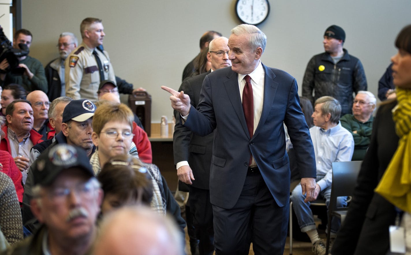 Governor Mark Dayton took questions from a standing room only crowd of a couple hundred people in his first &#x2018;Meeting with Mark&#x2019; in a town hall meeting in Duluth to talk about his budget proposal. Wednesday, March 20, 2013. Behind him is Revenue Commissioner Myron Frans. ] GLEN STUBBE * gstubbe@startribune.com