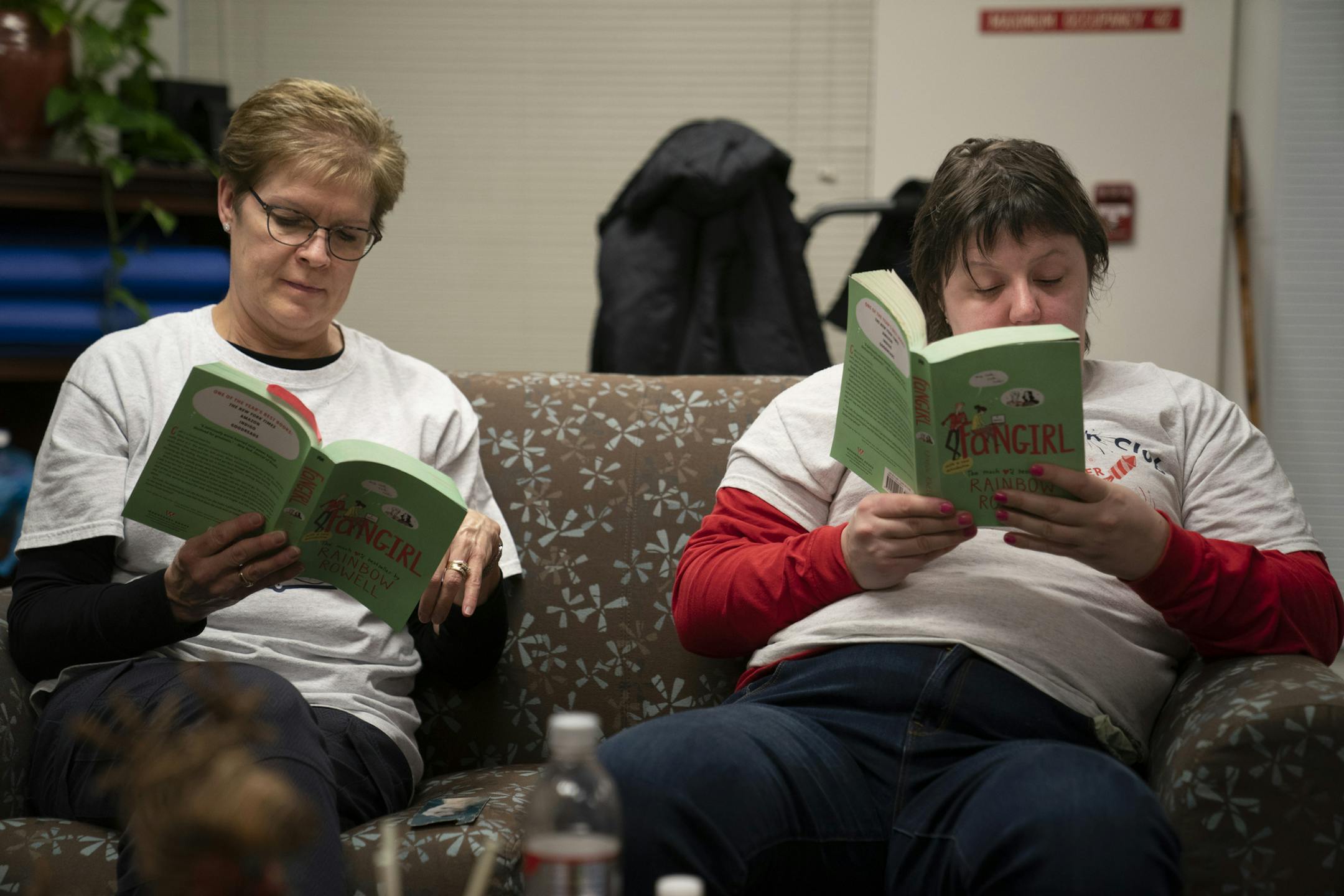 Shari Hegna sat next to Emily Pricco as Pricco read Fangirl: A Novel by Rainbow Rowell out loud to the group during the Rock Star Book Club at Fraser in Apple Valley, Minn., on Tuesday, December 3, 2019. ] RENEE JONES SCHNEIDER &#xa5; renee.jones@startribune.com