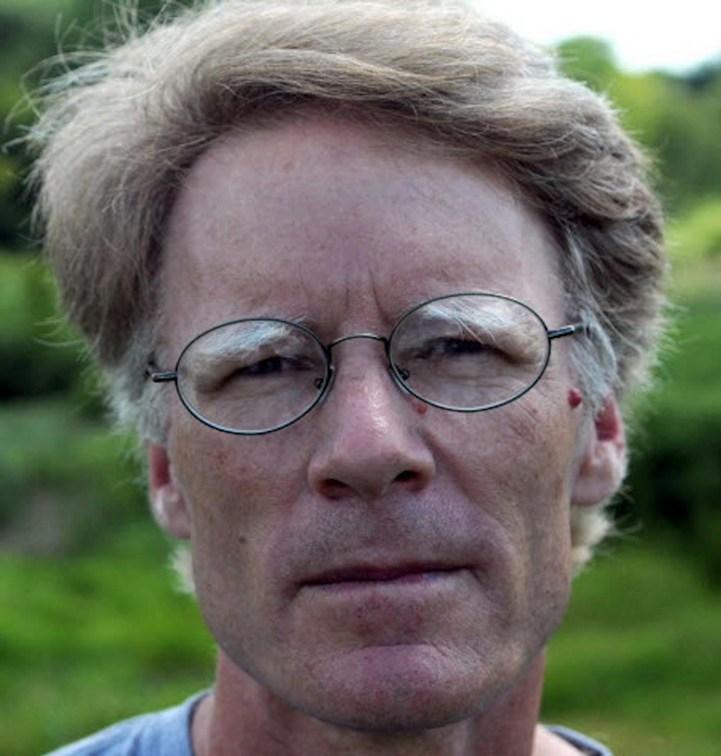 File photo of Steve Gardner, who was standing in front of trees that were cut down for the Plymouth development, the Willows. File photo from July 26, 2010.