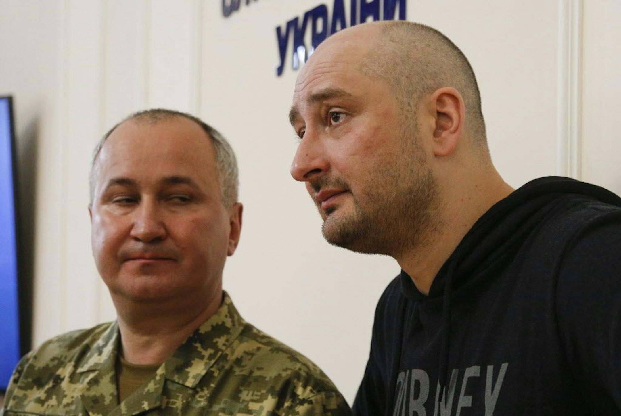Russian journalist Arkady Babchenko, right, and Vasily Gritsak, head of the Ukrainian Security Service speaks to the media during a news conference at the Ukrainian Security Service on Wednesday, May 30, 2018.