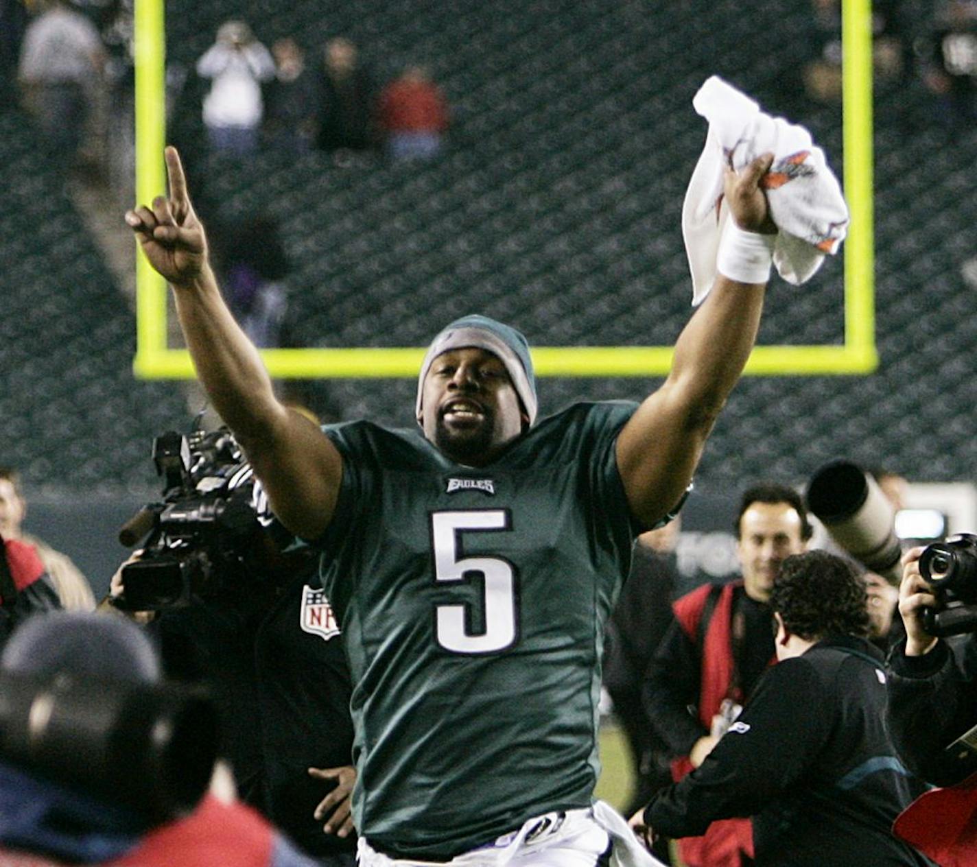 Philadelphia Eagles quarterback Donovan McNabb celebrates after the Eagles defeated the Dallas Cowboys 44-6 in an NFL football game, Sunday, Dec. 28, 2008, in Philadelphia. The Eagles secured a wild card playoff spot and will play the Minnesota Vikings next weekend.
