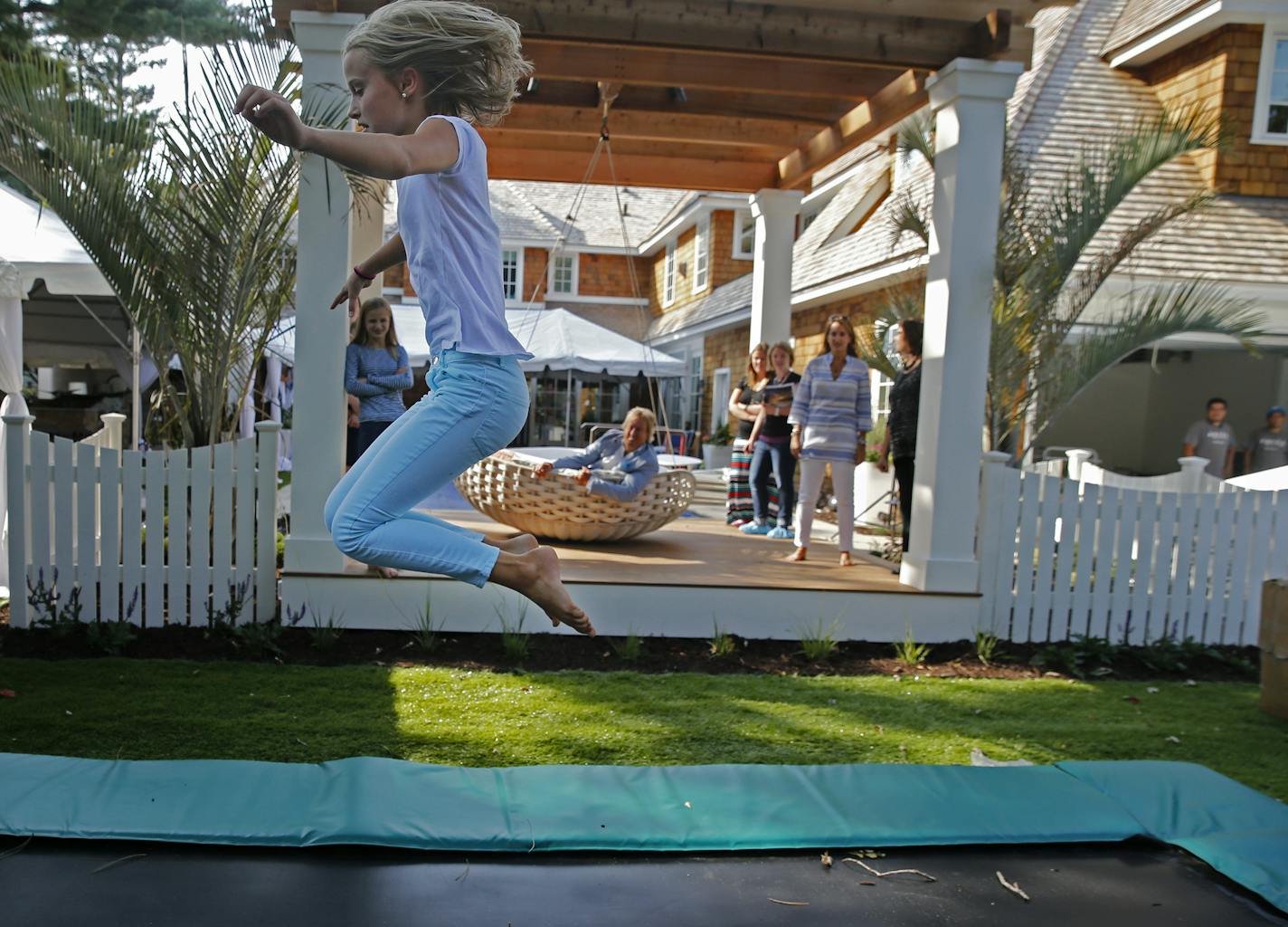 An in-ground trampoline is just one of the Minneapolis home's designer touches.