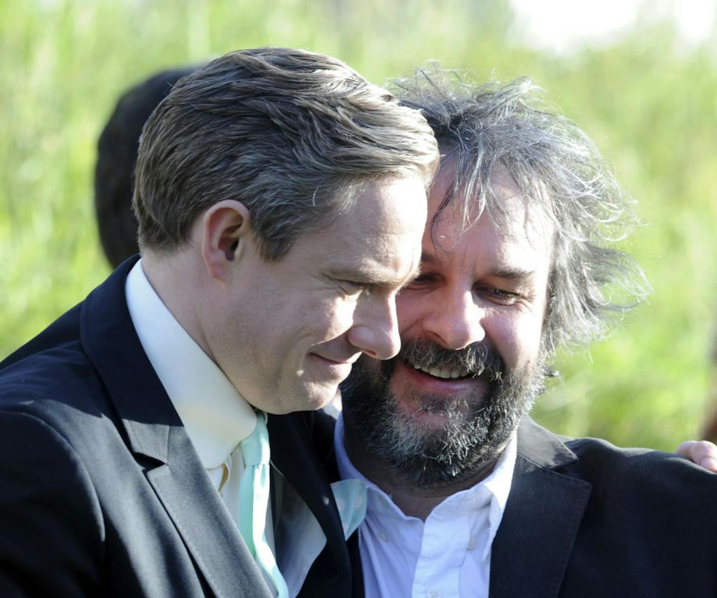 Cast member Martin Freeman, left, embraces director Peter Jackson at the premiere of "The Hobbit: An Unexpected Journey," at the Embassy Theatre, in Wellington, New Zealand, Wednesday, Nov. 28, 2012. (AP Photo/SNPA, Ross Setford) NEW ZEALAND OUT