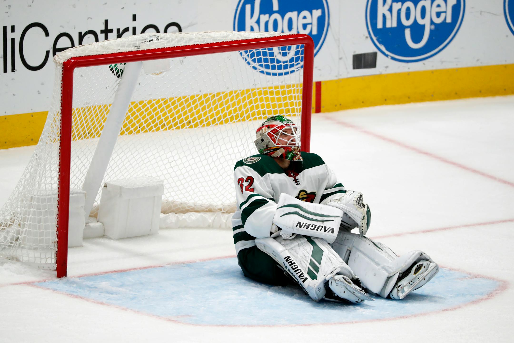 Wild goaltender Alex Stalock sits by the net after giving up a goal to Dallas Stars' Alexander Radulov on Oct. 29
