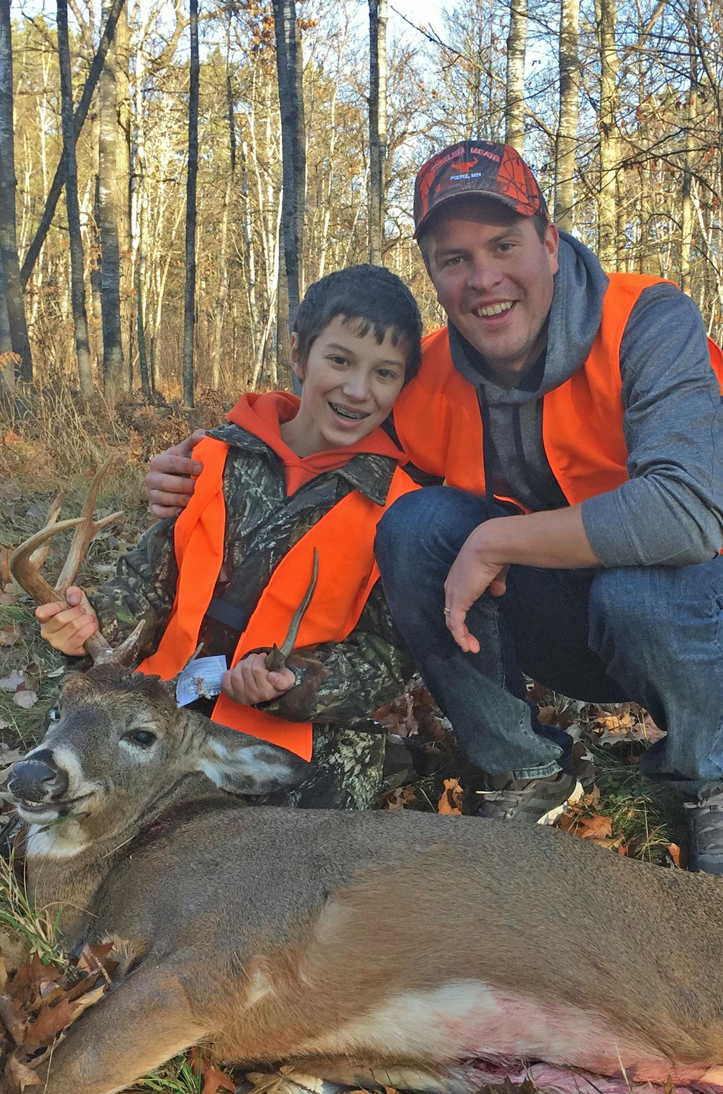 Tyler LaPorte and his opening day deer, along with his stepdad, Ty Goeman of Baxter.