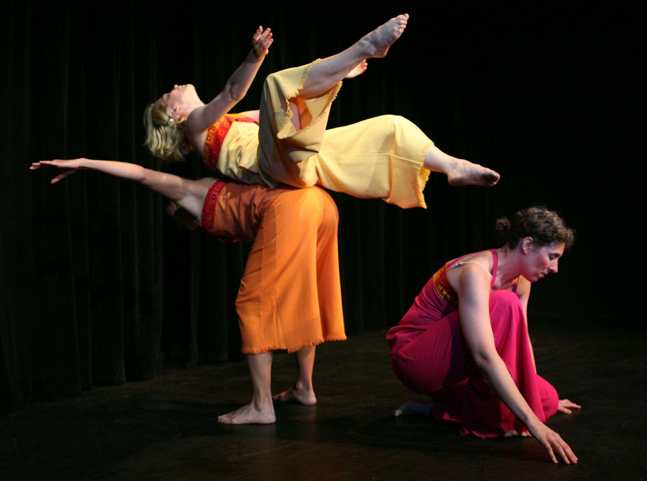 JEFF WHEELER ï jwheeler@startribune.com MINNEAPOLIS - 7/9/08 - John Munger's Third Rabbit Dance Ensemble presented Dance Shows That Got Into The Fringe Wednesday night at Bryant Lake Bowl in MInneapolis. Excerpts from seven works that will be in this year's Fringe Festival were featured on the diminutive stage. IN THIS PHOTO: ] Rachel Barnes, top, Ann Jacobson, and Paulette Mattson, right, of the Ray Terrill Dance Group performed "We Walk Among You" Wednesday night at Bryant Lake Bowl. ORG