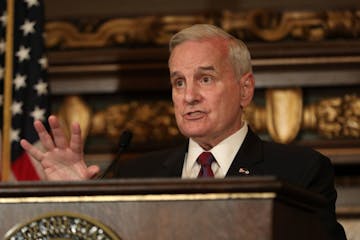 Gov. Mark Dayton spoke from the podium during Wednesday's press conference.