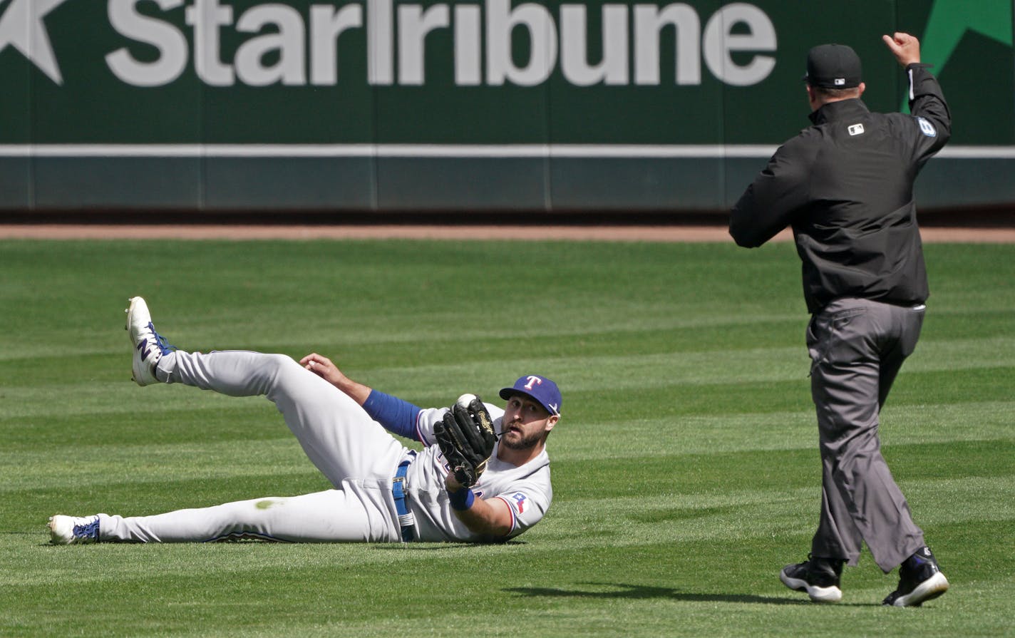 Texas Rangers right fielder Joey Gallo makes a diving catch on a Miguel Sano hit in the 10th inning to end the Minnesota Twins' chances of coming back on Thursday, May 6, 2021 at Target Field in Minneapolis, Minnesota. The Twins lost to the Rangers 4-3. (Brian Peterson/Minneapolis Star Tribune/TNS) ORG XMIT: 15657517W