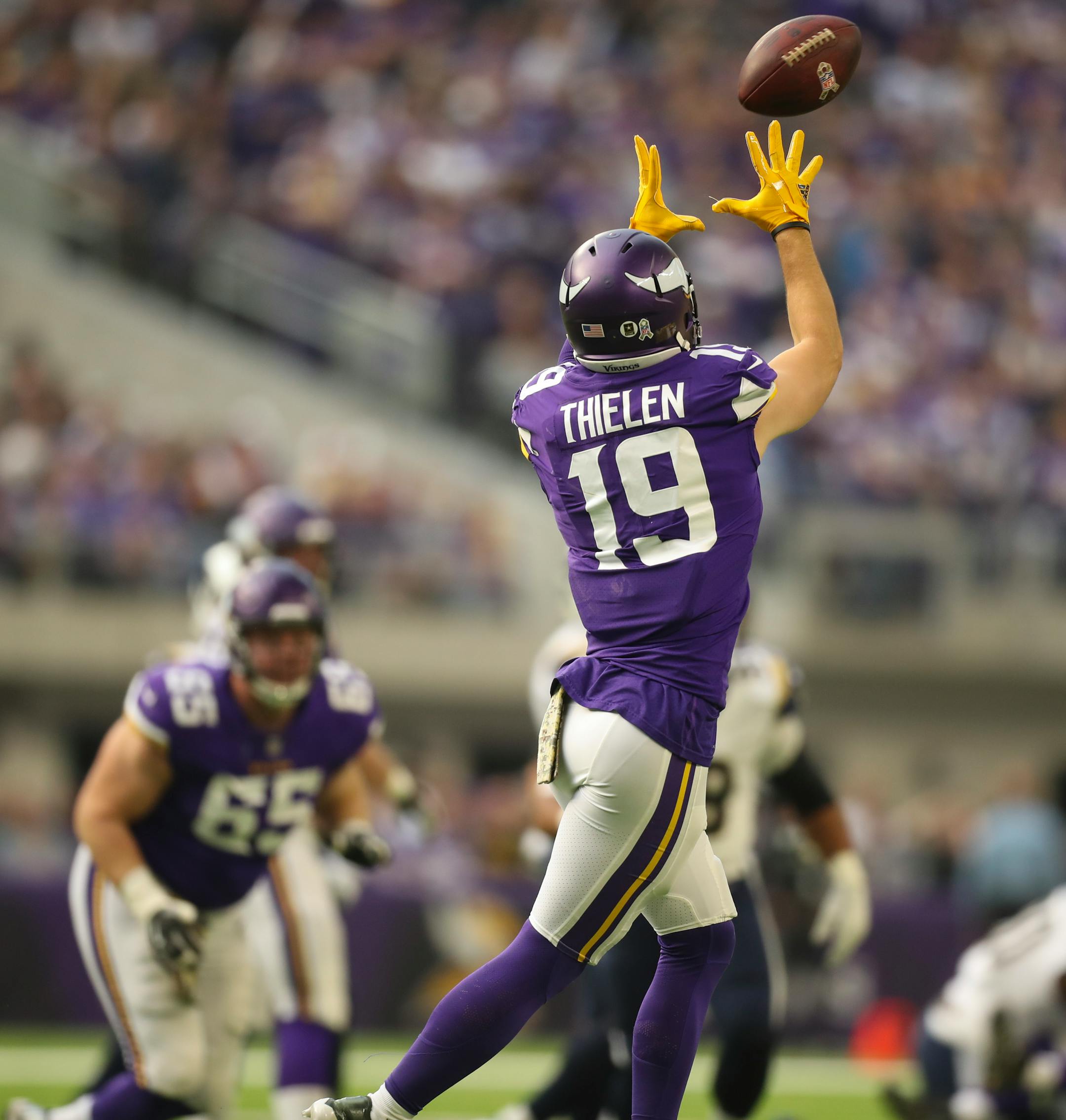 Minnesota Vikings wide receiver Adam Thielen (19) caught a pass towards the end of the first quarter for a 12 yard gain.