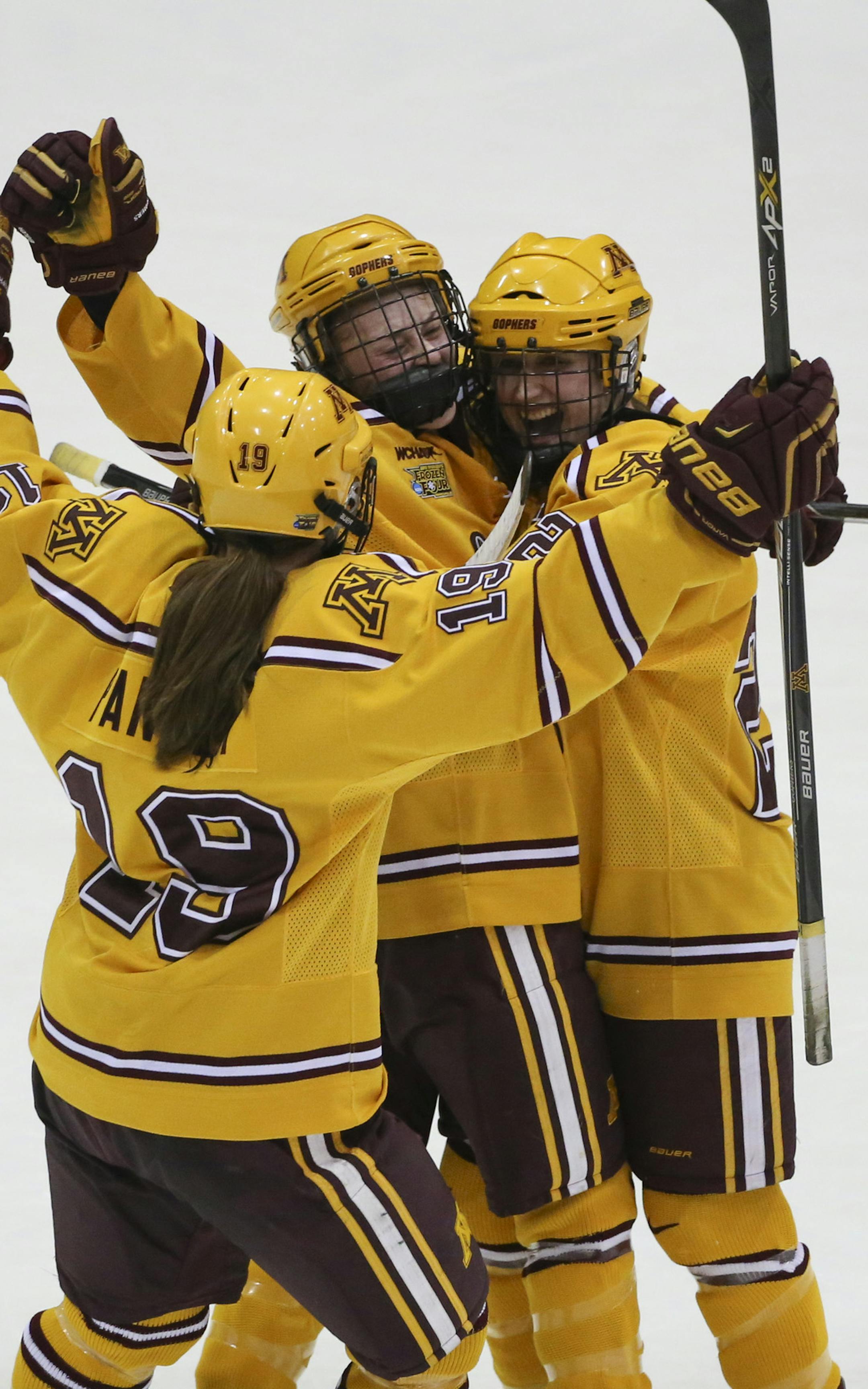The Gophers' Rachael Bona (7) celebrated her empty net goal with teammates Kelly Pannek (19)and Meghan Lorence (20) in the third period Sunday afternoon at Ridder Arena. ] JEFF WHEELER ï jeff.wheeler@startribune.com The University of Minnesota women's hockey team beat Harvard 4-1 for the NCAA Women's Frozen Four Championship Sunday afternoon, March 22, 2015 at Ridder Arena in Minneapolis.