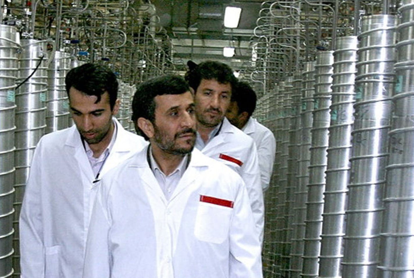 Iranian President Mahmoud Ahmadinejad, center, visits the Natanz Uranium Enrichment Facility some 200 miles south of the capital, Tehran, Iran.