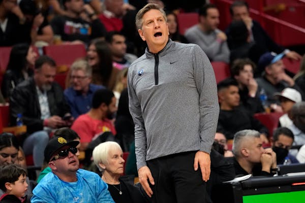 Minnesota Timberwolves head coach Chris Finch reacts to a foul called during the second half of an NBA basketball game against the Miami Heat, Monday,