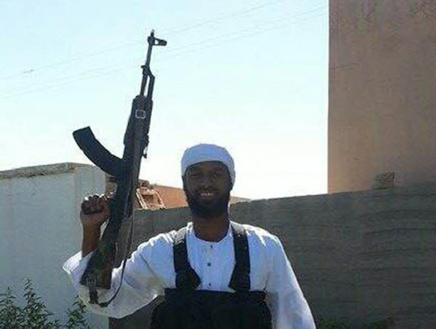 Abdirahmaan Muhumed, with a rifle, reportedly has died in Syria fighting for terrorists.