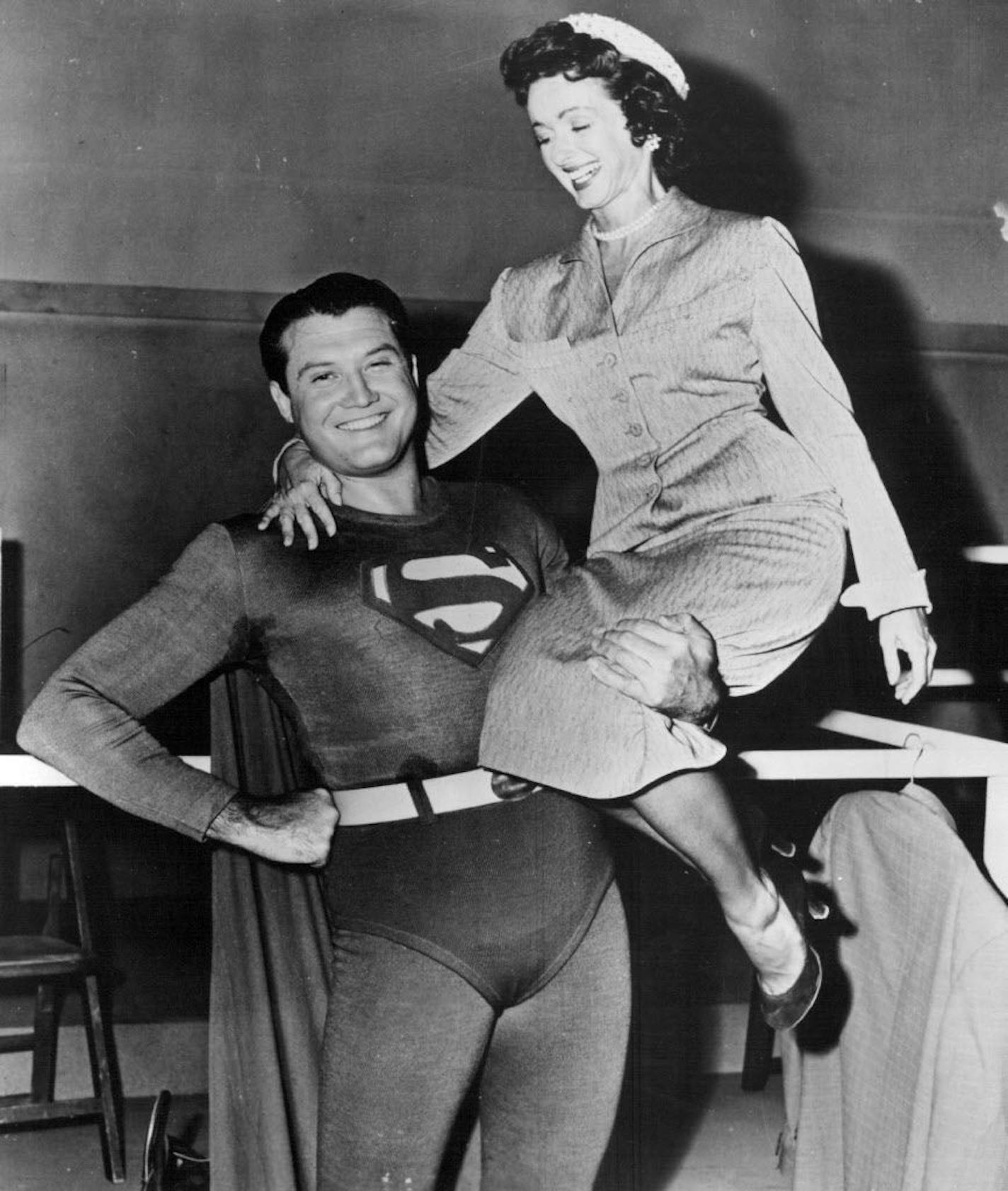 George Reeves, who played Superman, holds Noel Neill, who played Lois Lane.