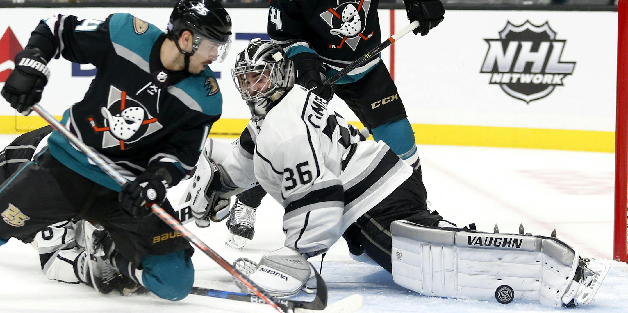 Los Angeles Kings goalie Jack Campbell (36) stops a shot by Anaheim Ducks forward Adam Henrique (14) during the third period of an NHL hockey game Tuesday, Nov. 6, 2018, in Los Angeles. The Kings won 4-1. (AP Photo/Ringo H.W. Chiu)