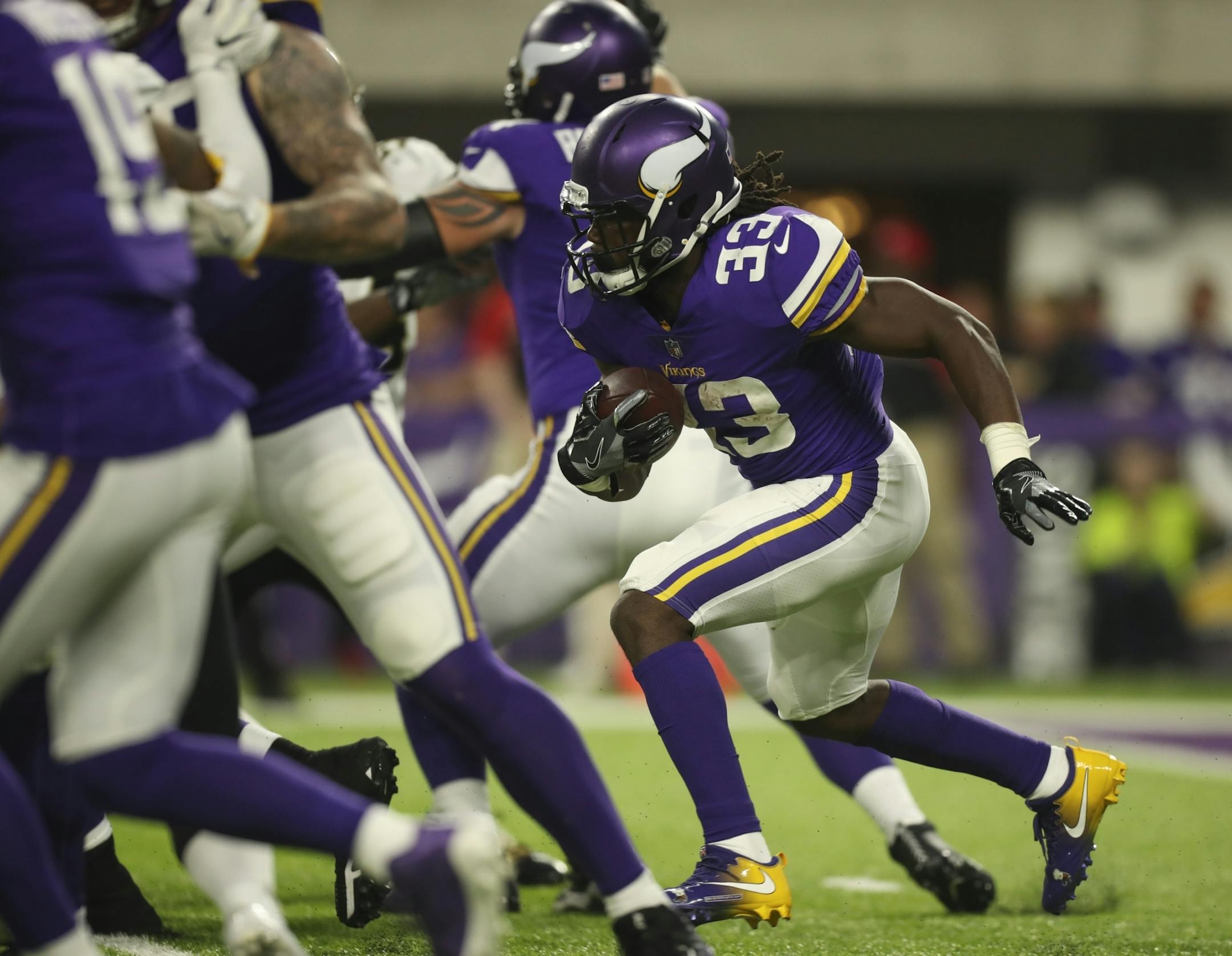 Minnesota Vikings running back Dalvin Cook (33) carried the ball in the second quarter.